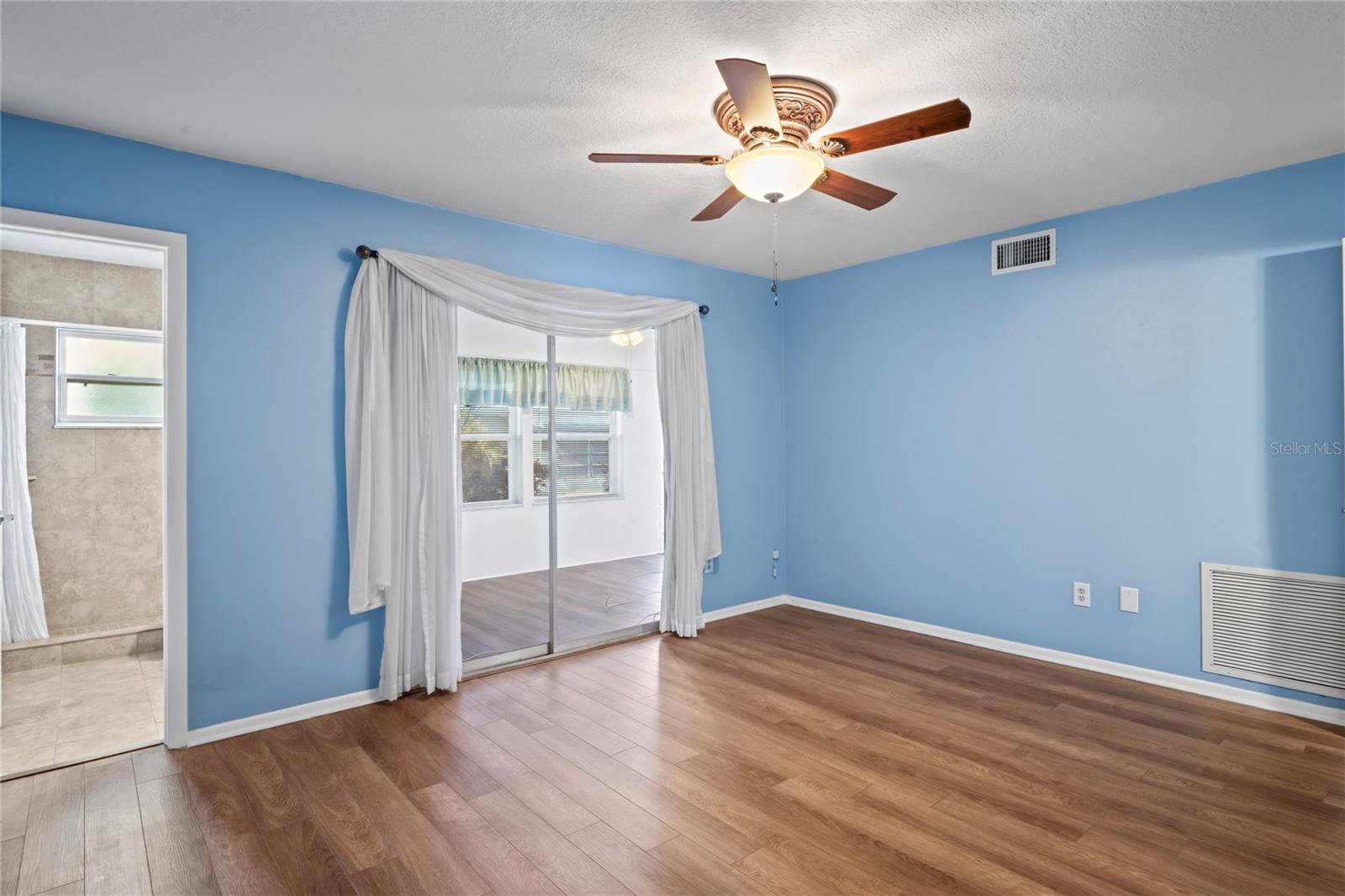 Private bathroom with large walk in shower