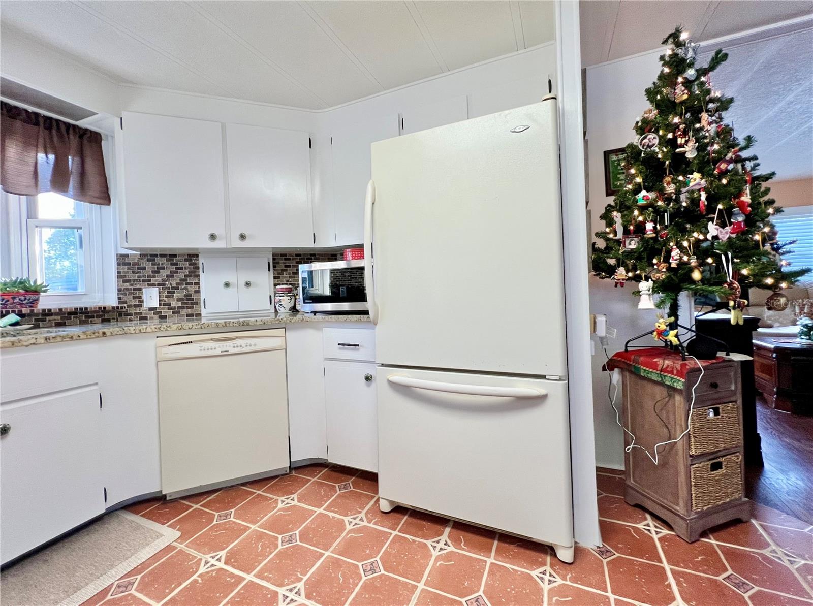 Kitchen with Newer countertops and appliance garages