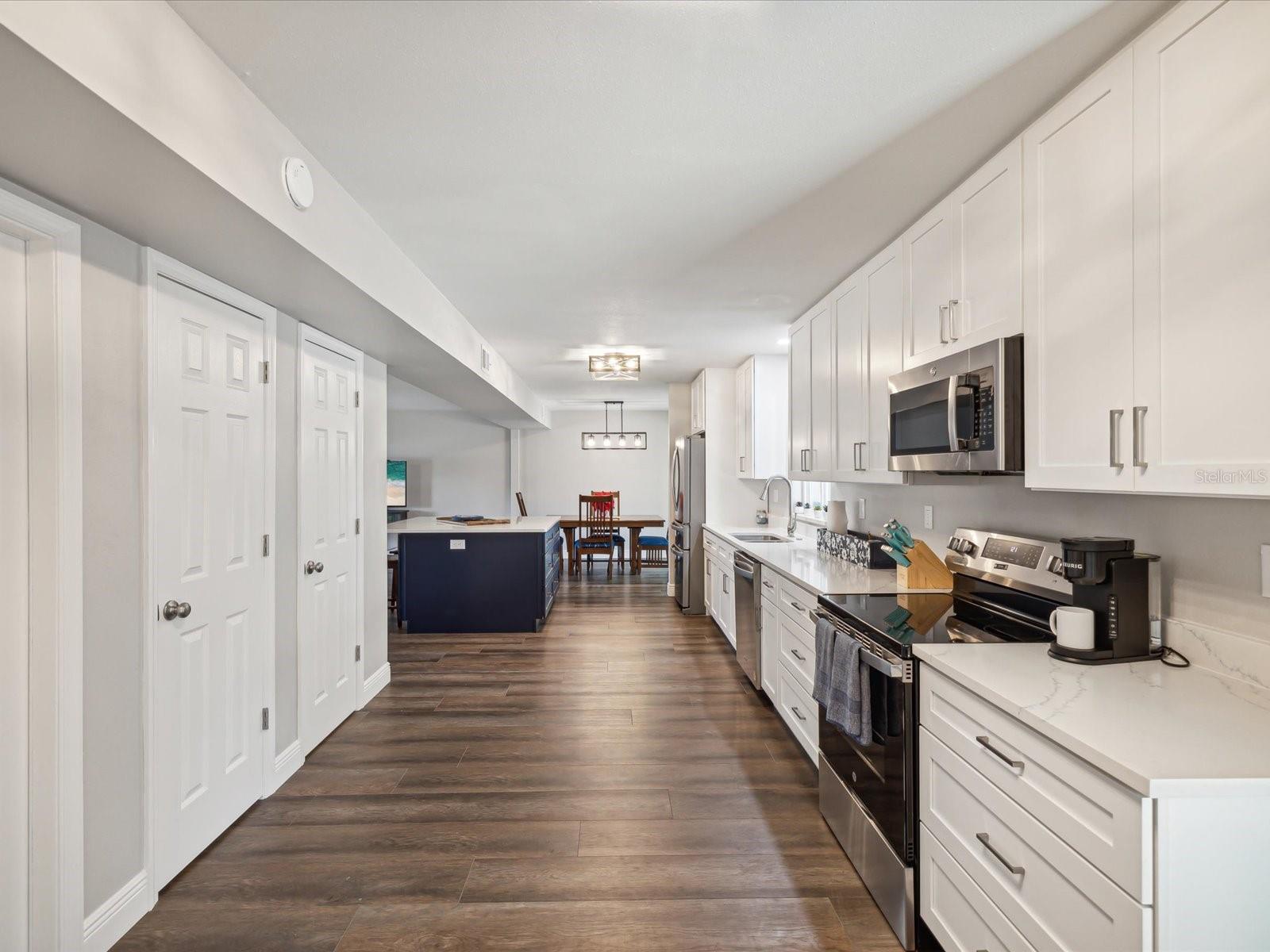 Doors to pantry and half bath