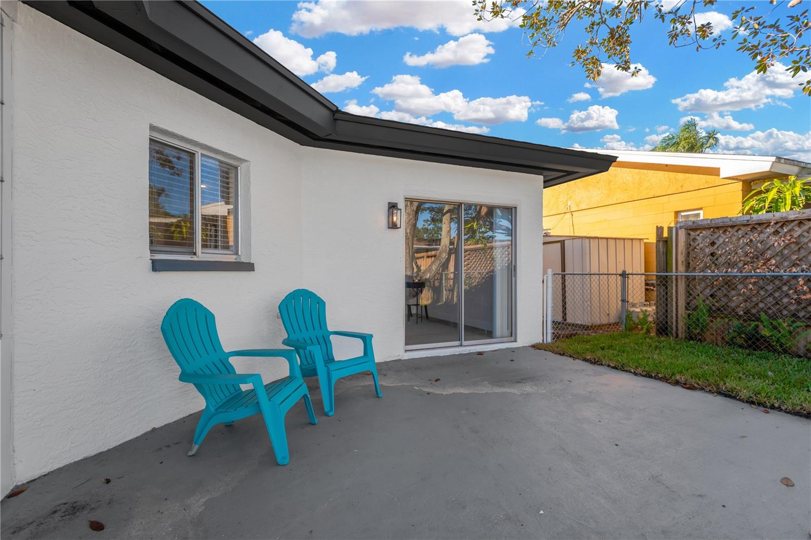 Back Patio with Guest Bedroom Slider, Kitchen window