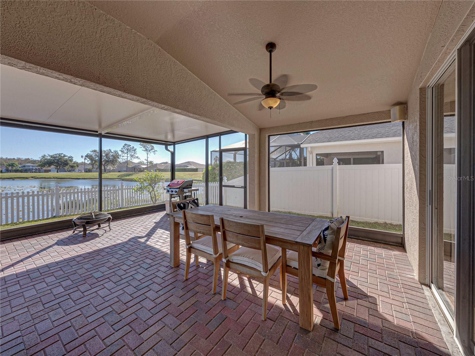 Covered screen lanai has access to the primary and the family room.