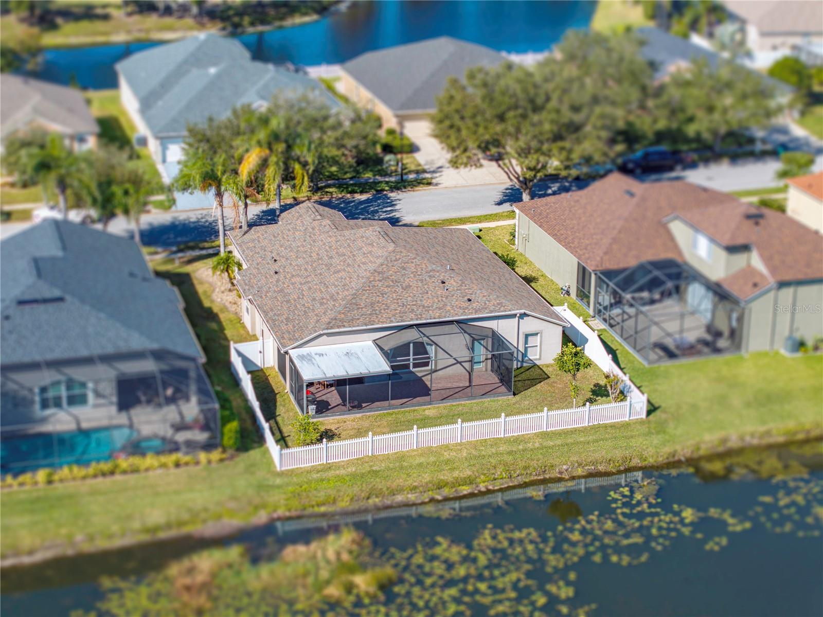 Aerial view of back of home. Fully fenced back yard.