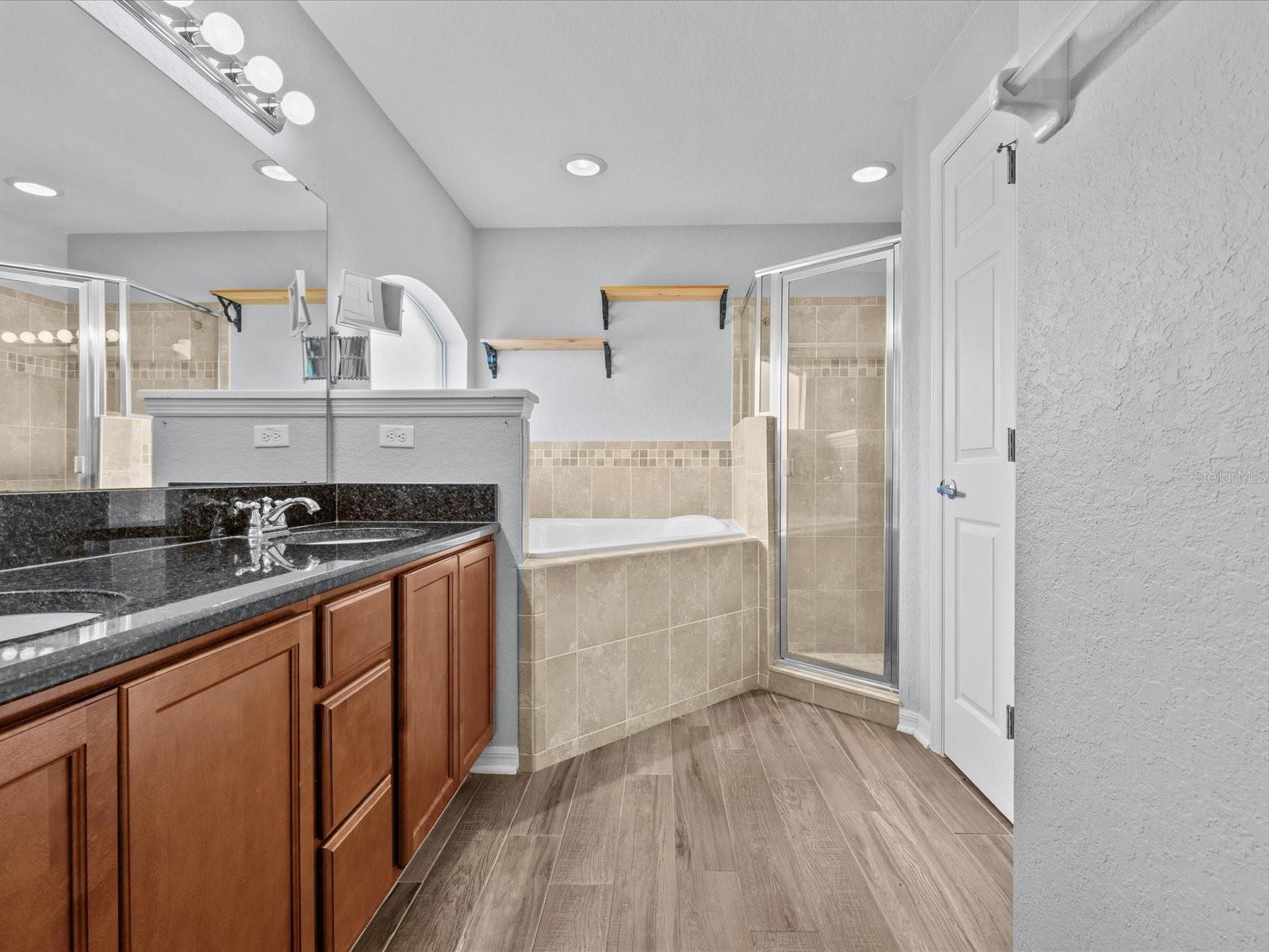 Primary Bathroom with Dual Vanity, Soaking Tub, Walk In Shower