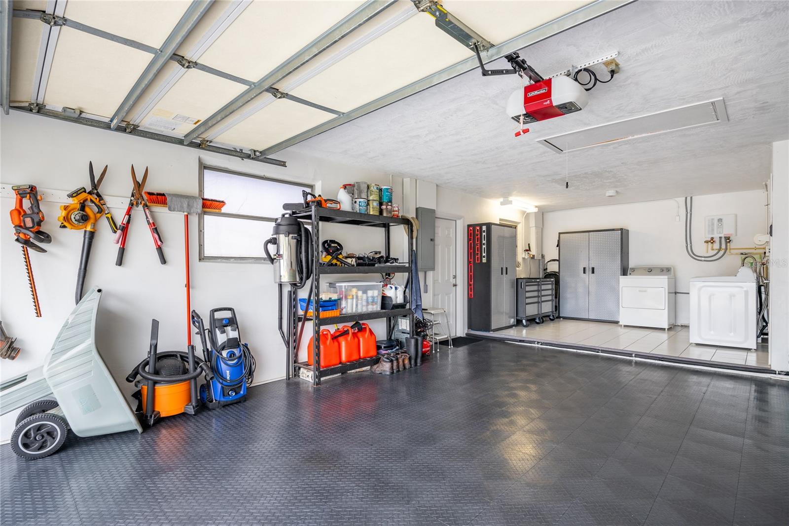 Garages are often nothing much to look at but not THIS ONE!     Neat and tidy defines this space!