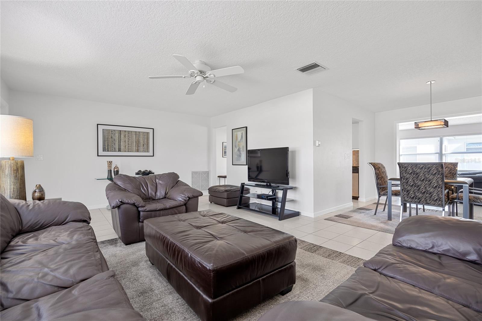 The Formal Living room is open to the Dining Room