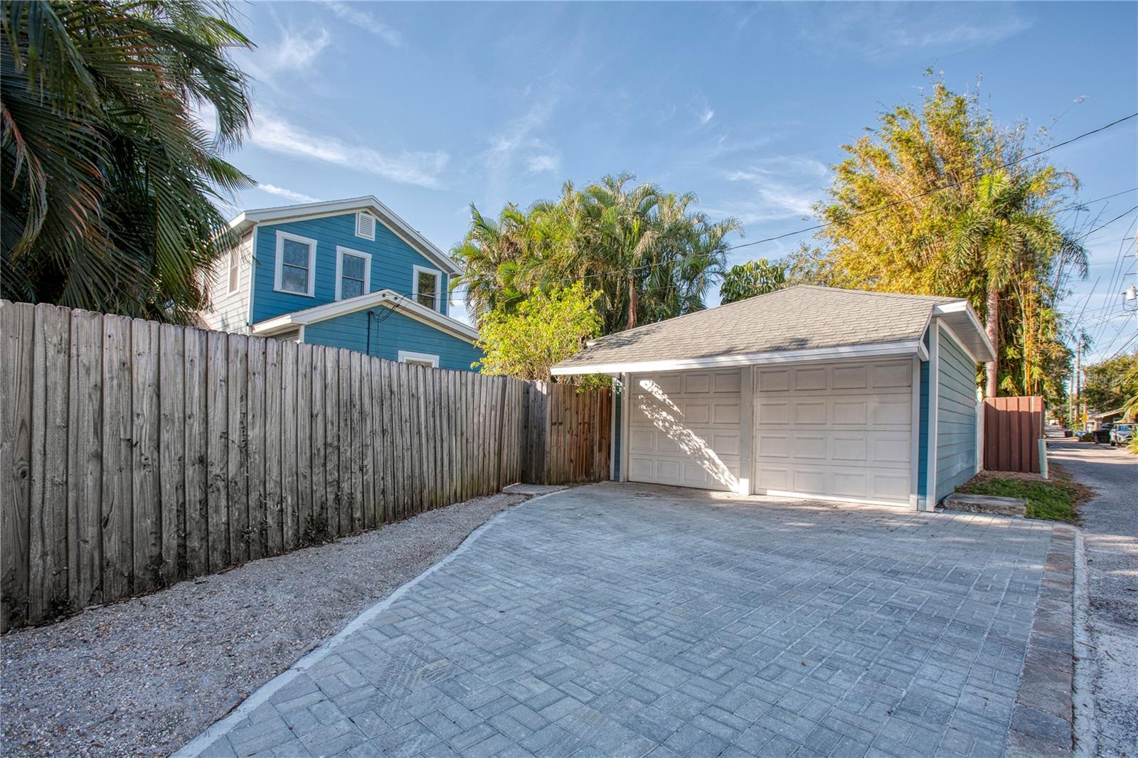 Alley access and paver driveway