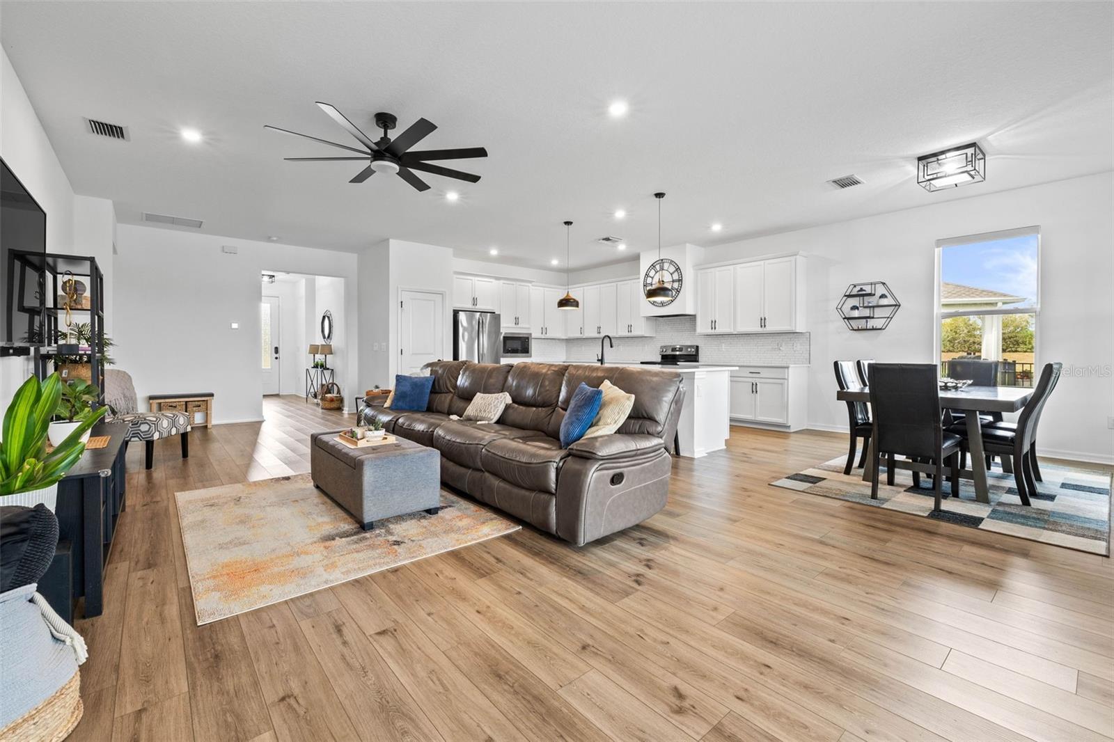 The lux vinyl flooring throughout the main living area is friendly to all colors.