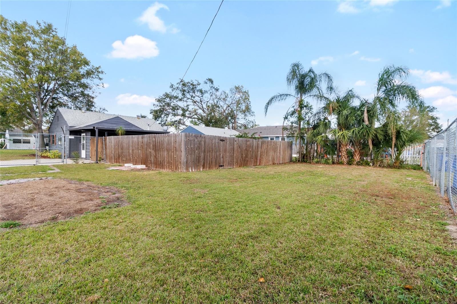 More back yard beyond the privacy fence