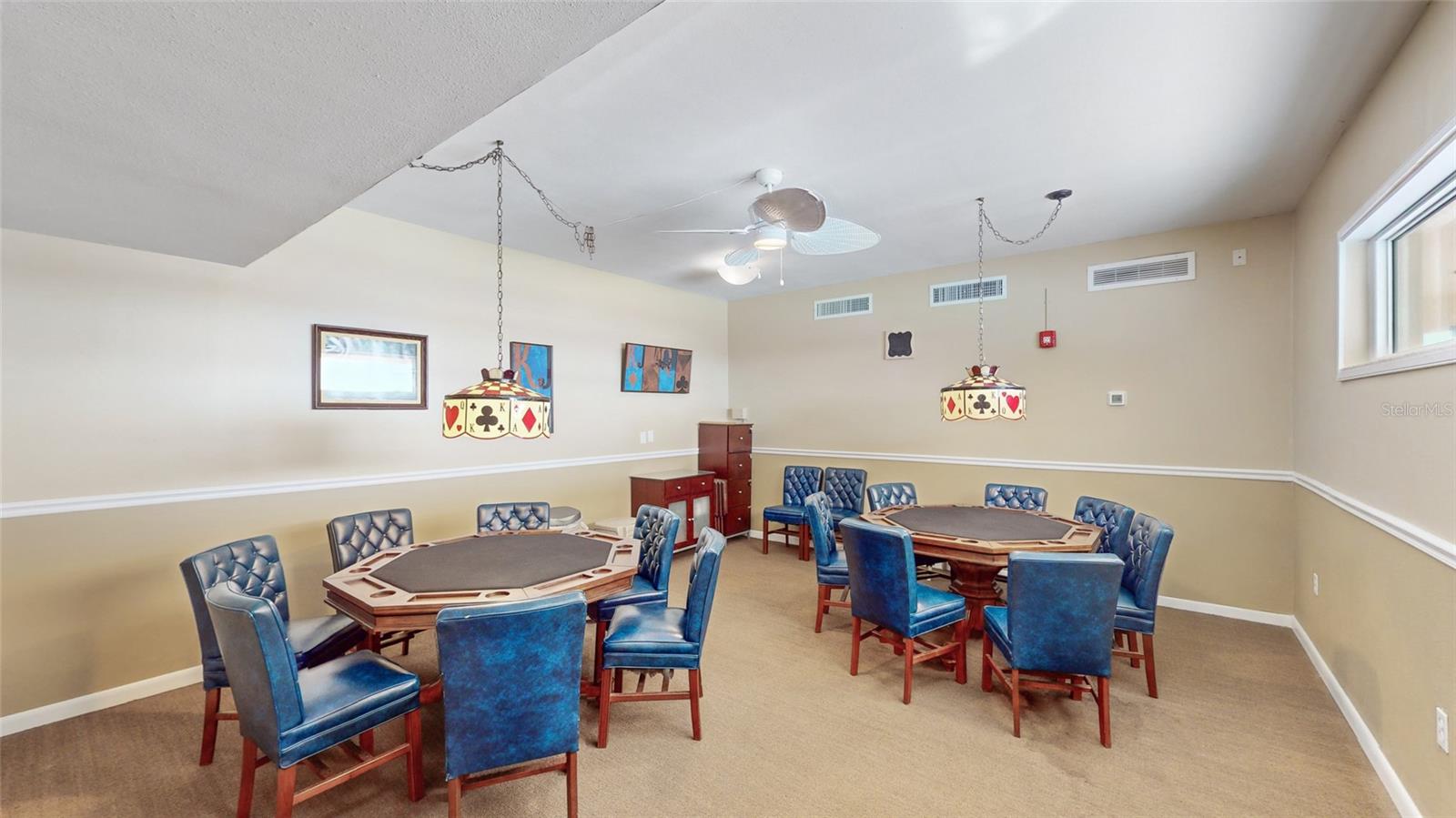 Poker tables in the Community Clubhouse