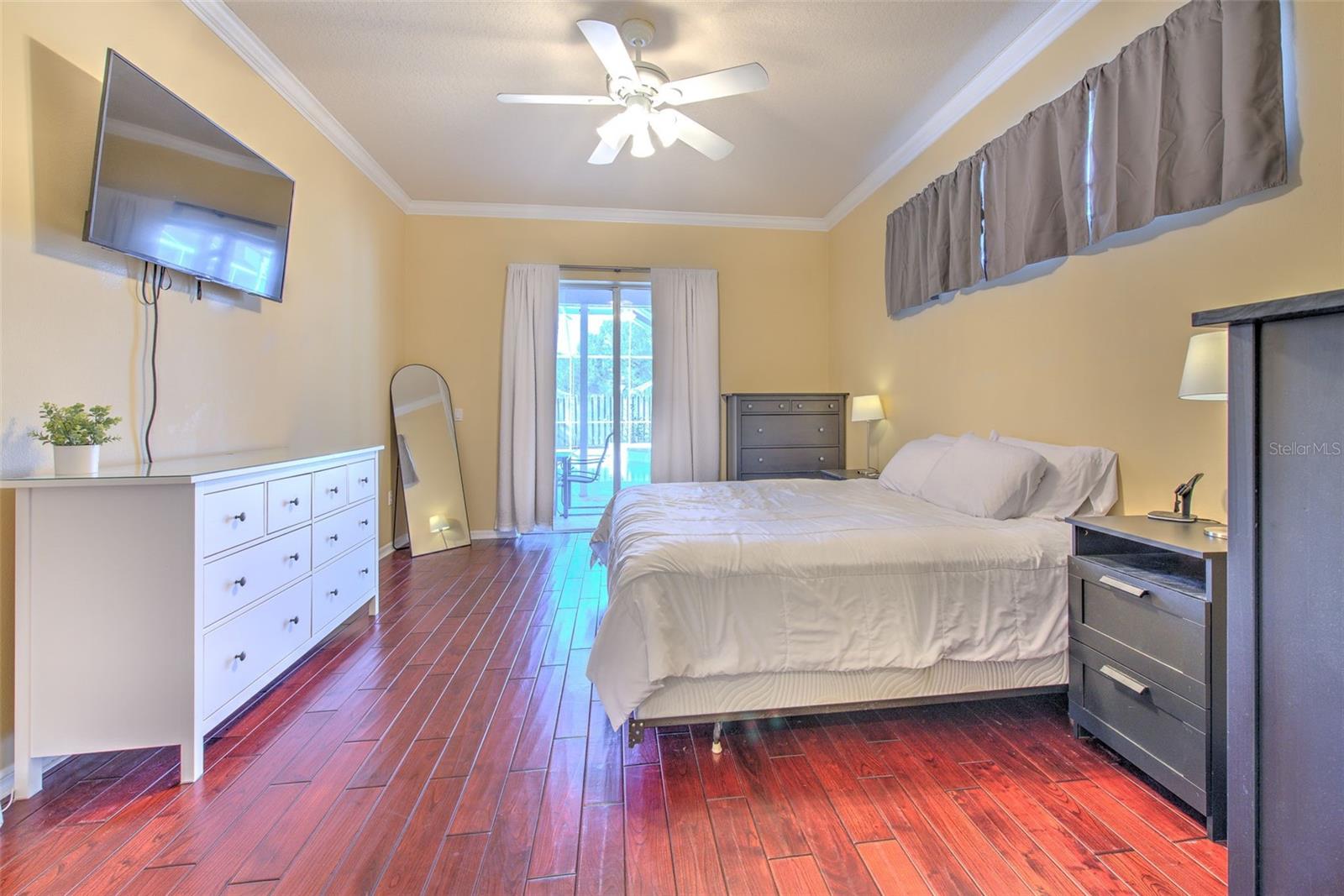 Primary Bedroom with slider to patio