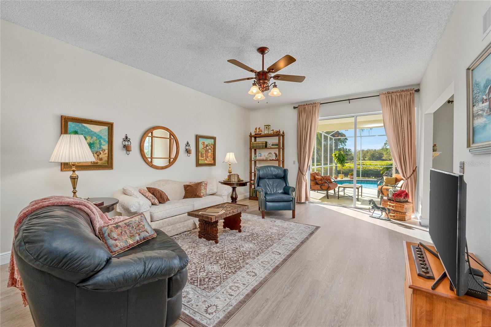 Light and Bright Family Room with updated flooring