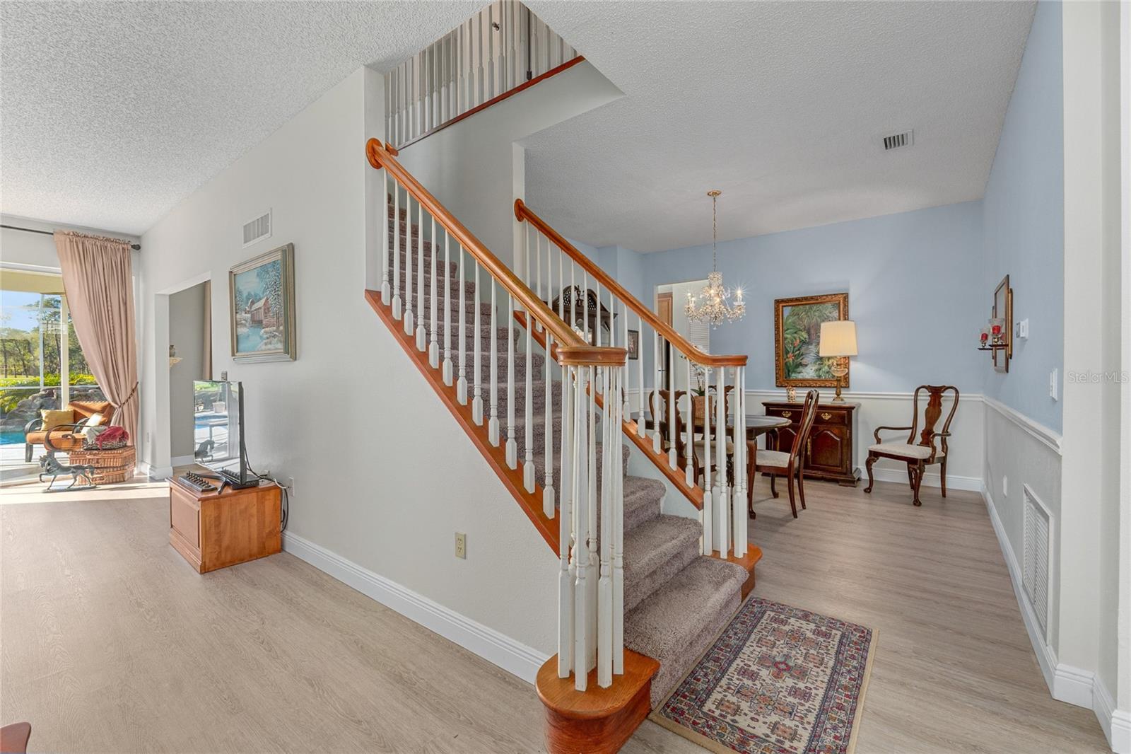 Walk upstairs to access 4 bedrooms and 2 bathrooms