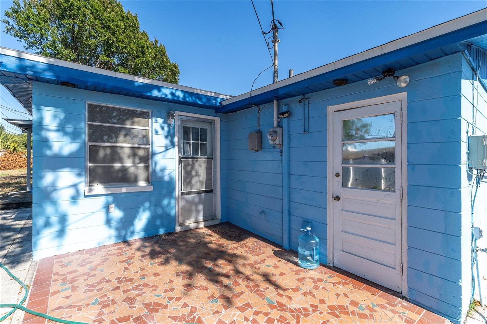 backyard patio with access from garage and bonus room