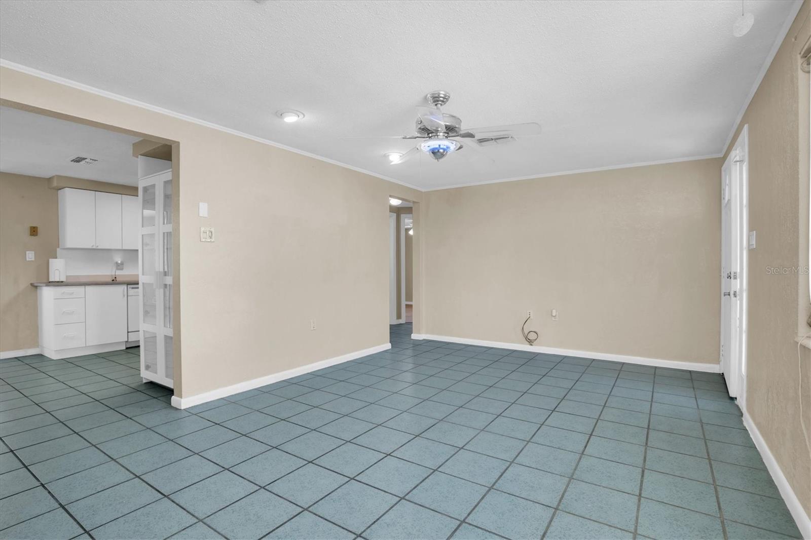 open living and eat in kitchen area. with new pantry cabinets.