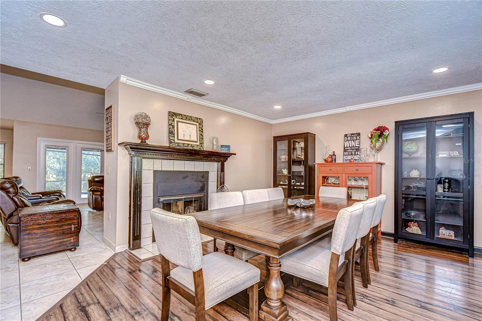 Dining room is highlighted by a grand fireplace!