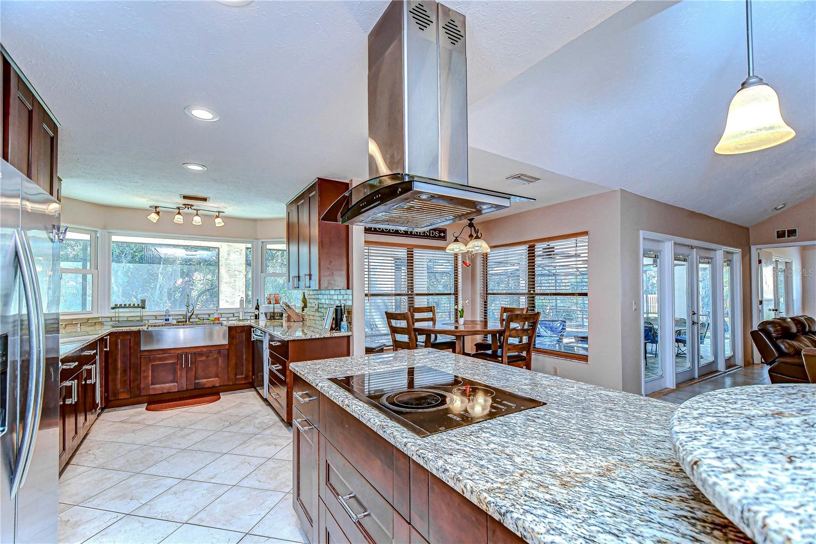 Beautiful kitchen boasting granite countertops, stainless steel appliances, and endless space!