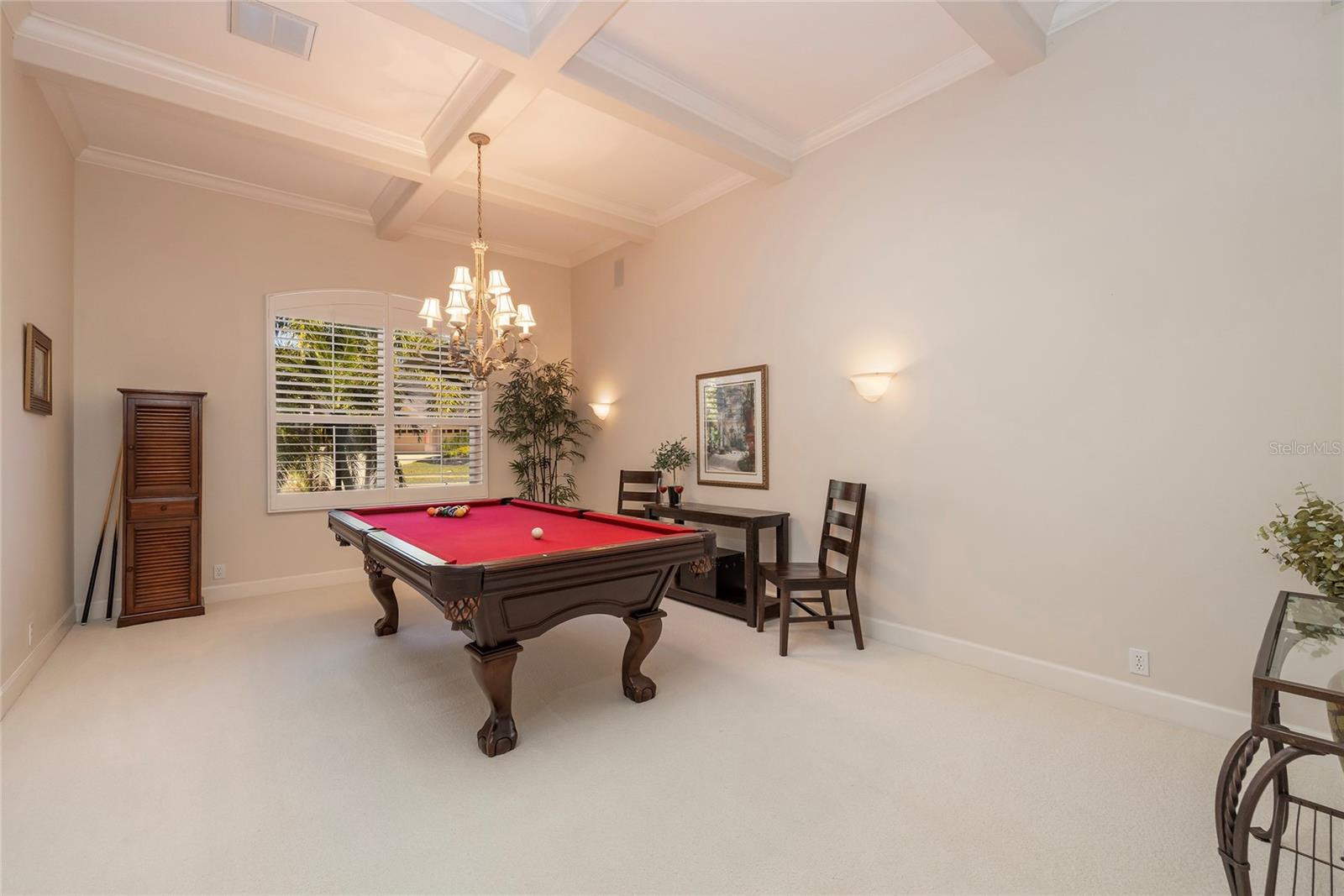 Formal dining room off the entry and conveniently located to kitchen.  Currently used as billiard room