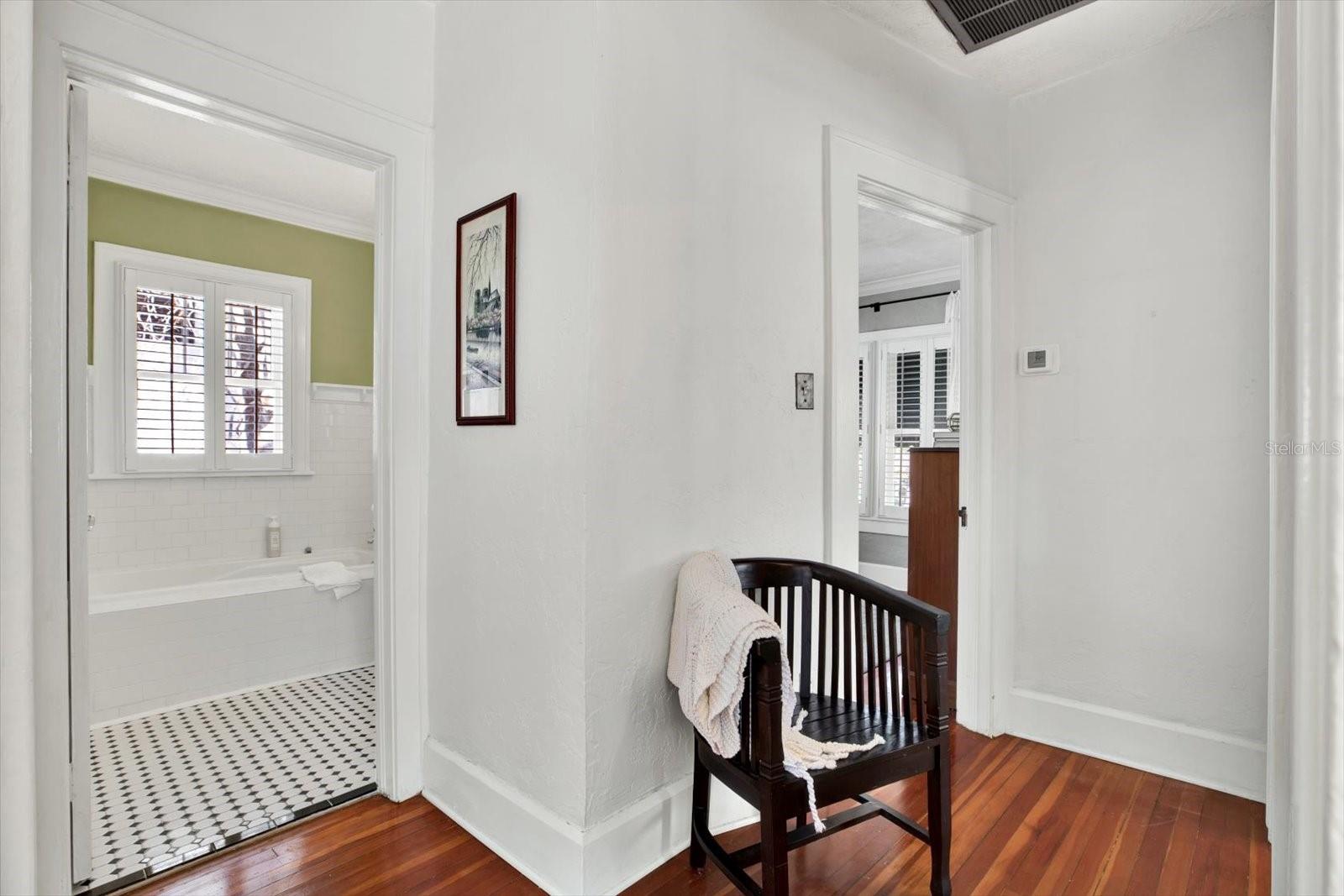 View of upstairs bathroom and third bedroom (second floor)