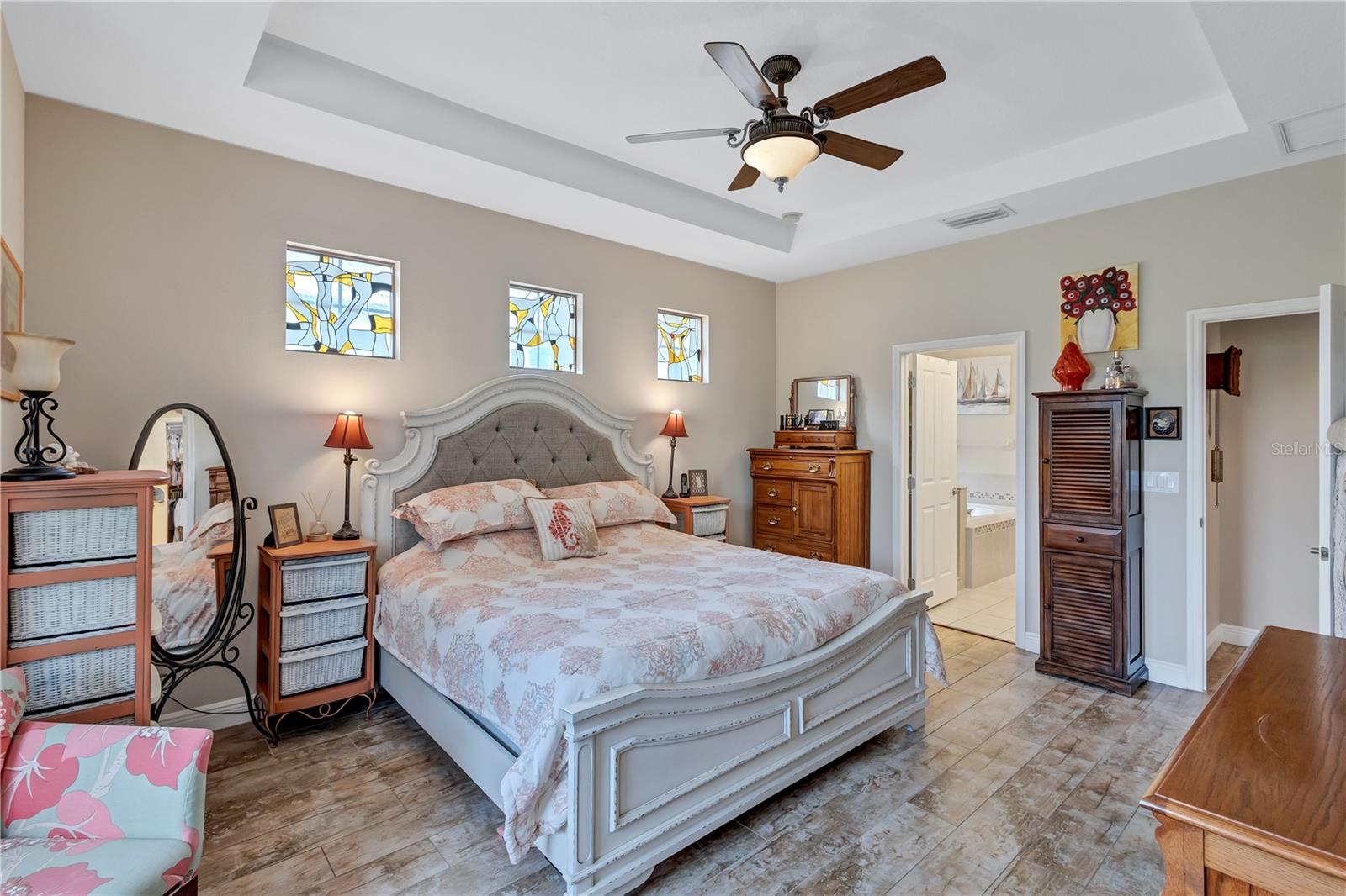 Primary bedroom first floor, with ensuite bathroom and walk-in closet