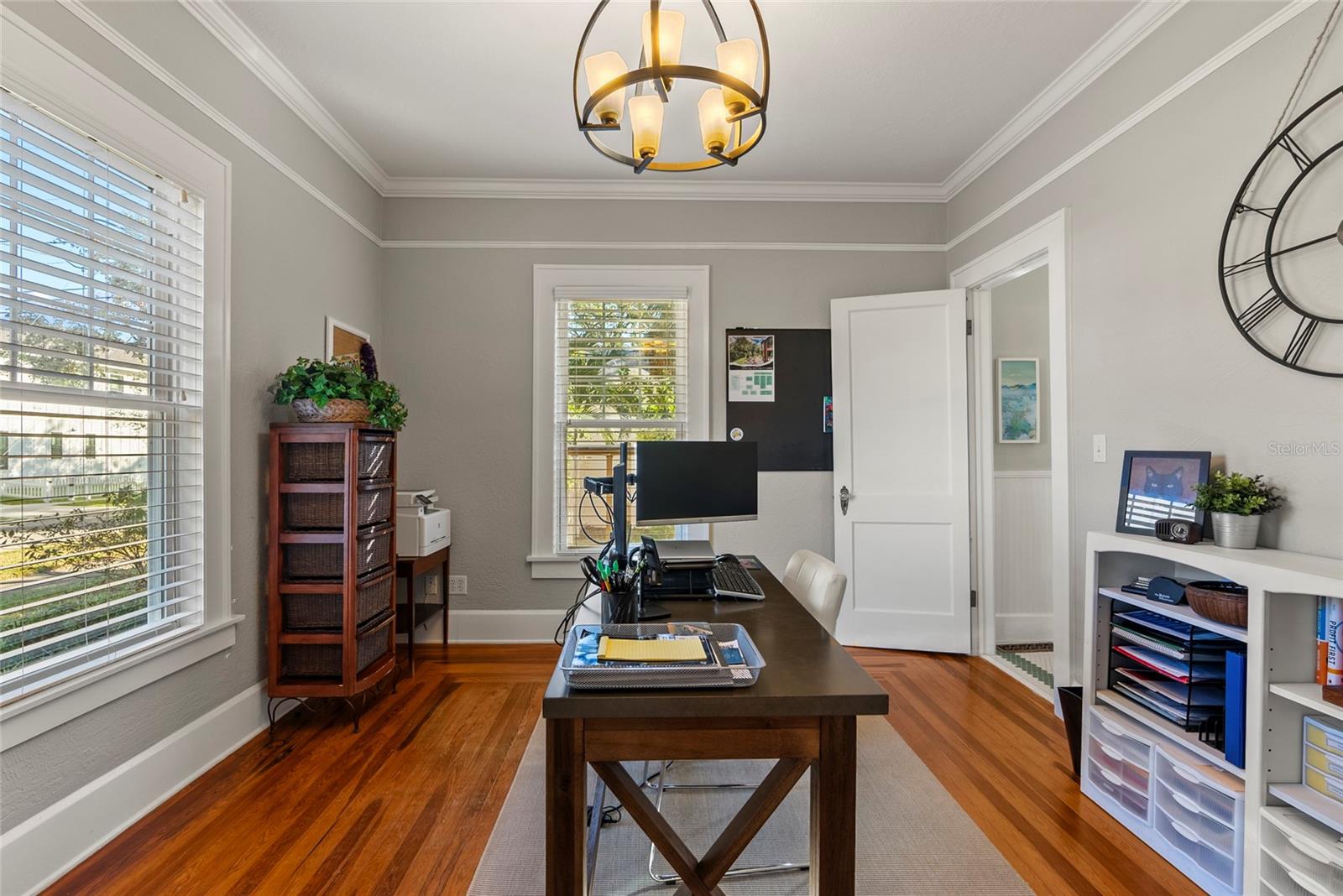 This bedroom, currently being used as an office, has direct access to the first floor bathroom.