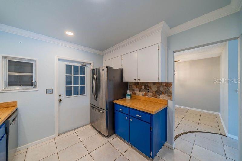 Kitchen with door to garage and entryway from dining room