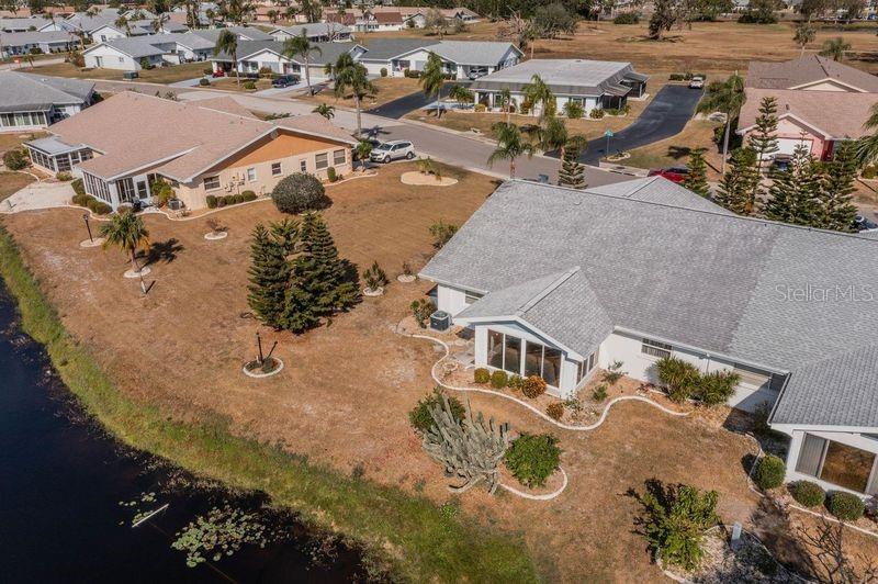 Backyard with extended side yard and water view