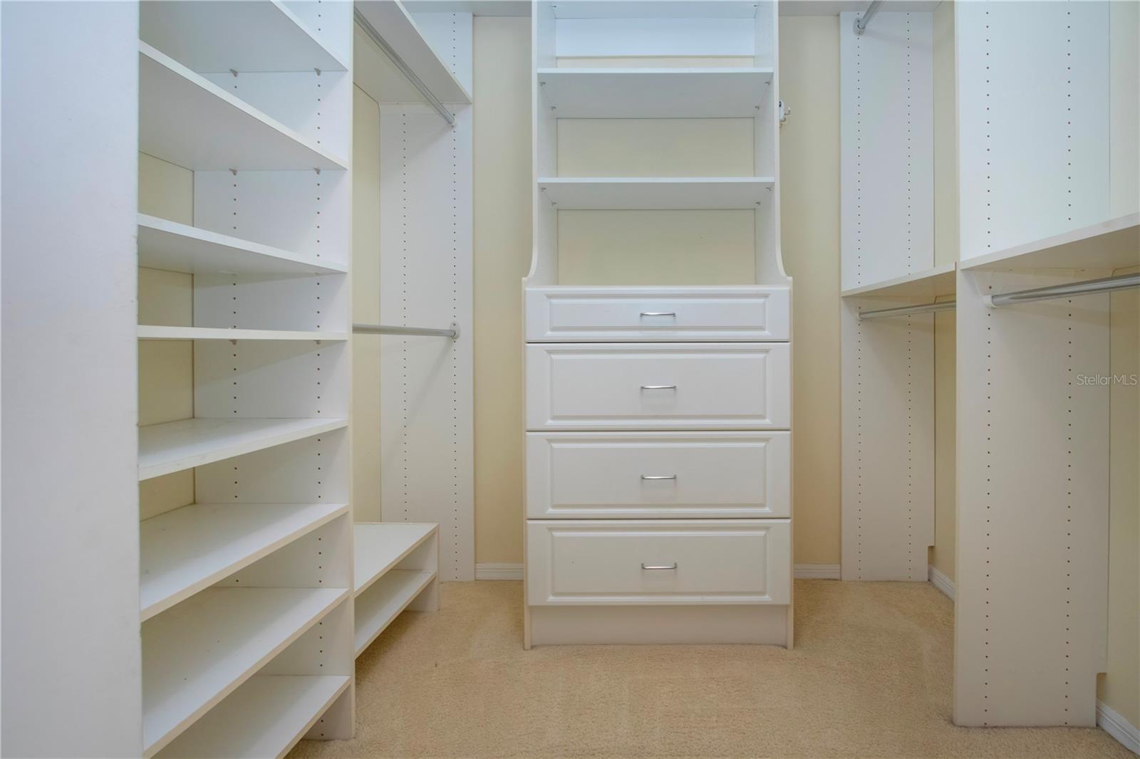 One of 2 Large walk in Closets in Primary Bedroom