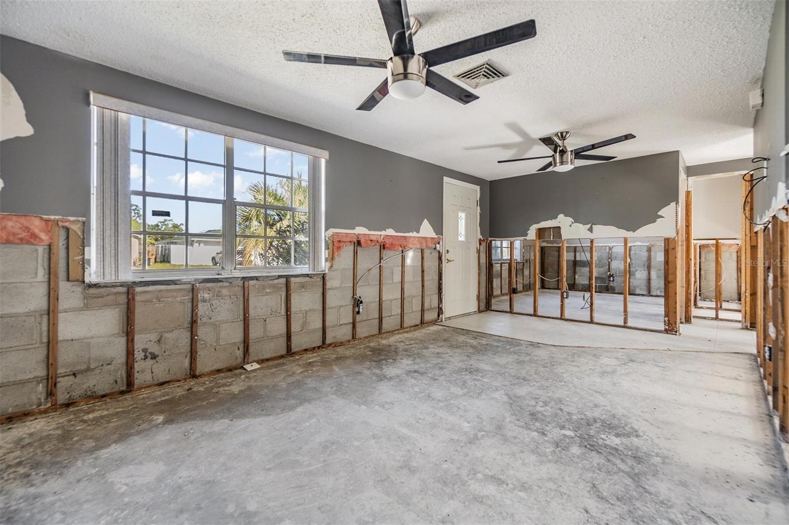 Living room with front door.