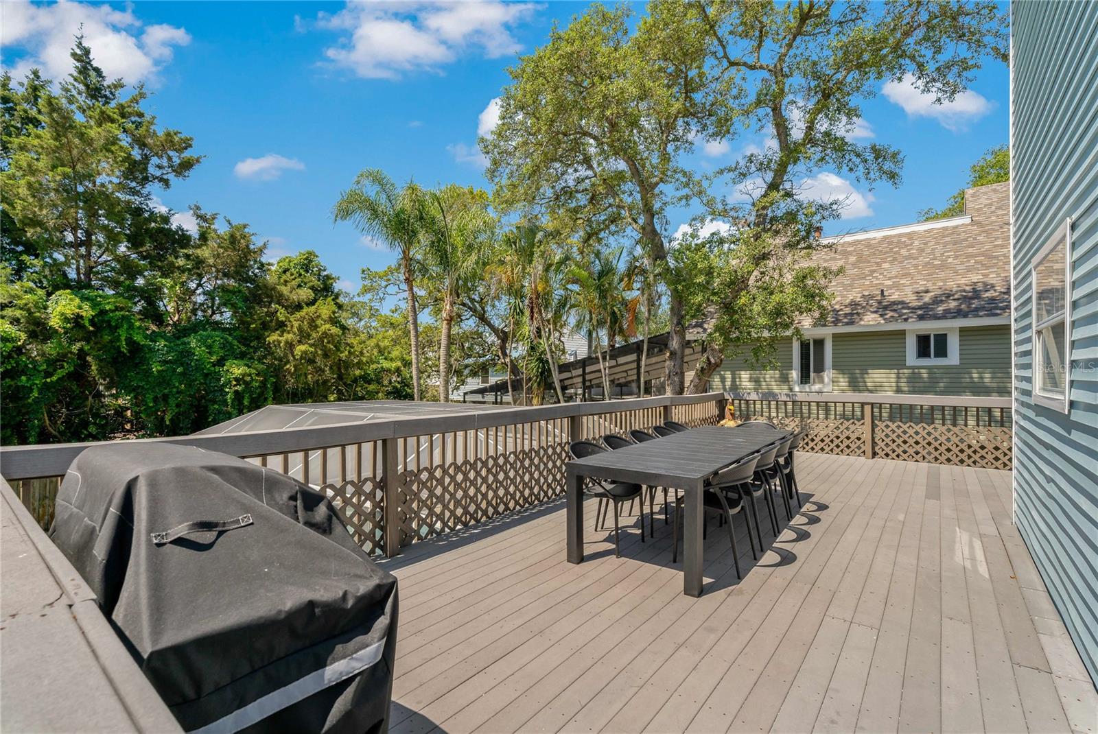 KEEP AN EYE ON THE POOL ACTIVITY WHILE GRILLING YOUR DINNER