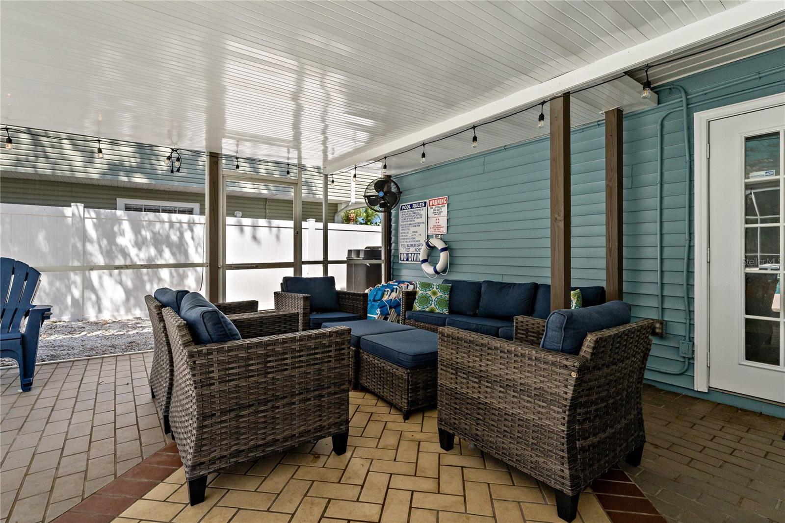 COVERED, SCREENED IN PATIO OFF OF THE POOL!