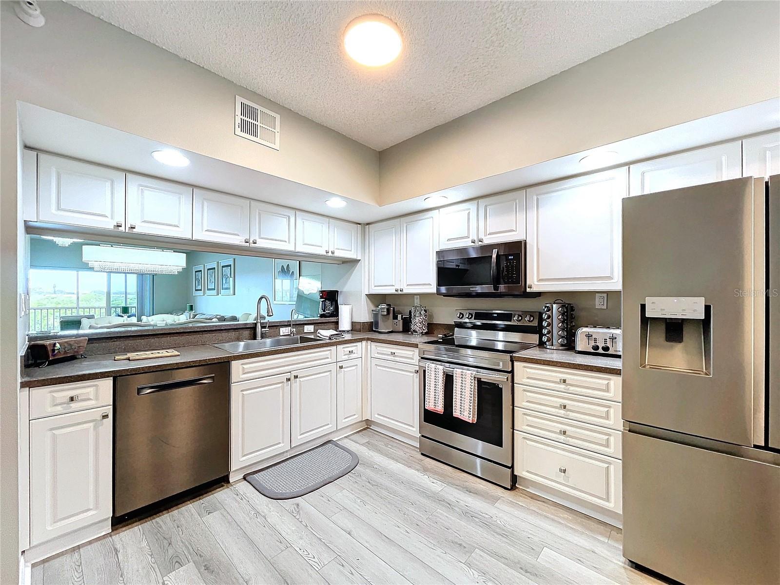 Enjoy the stainless appliances and updated flooring throughout the condo.