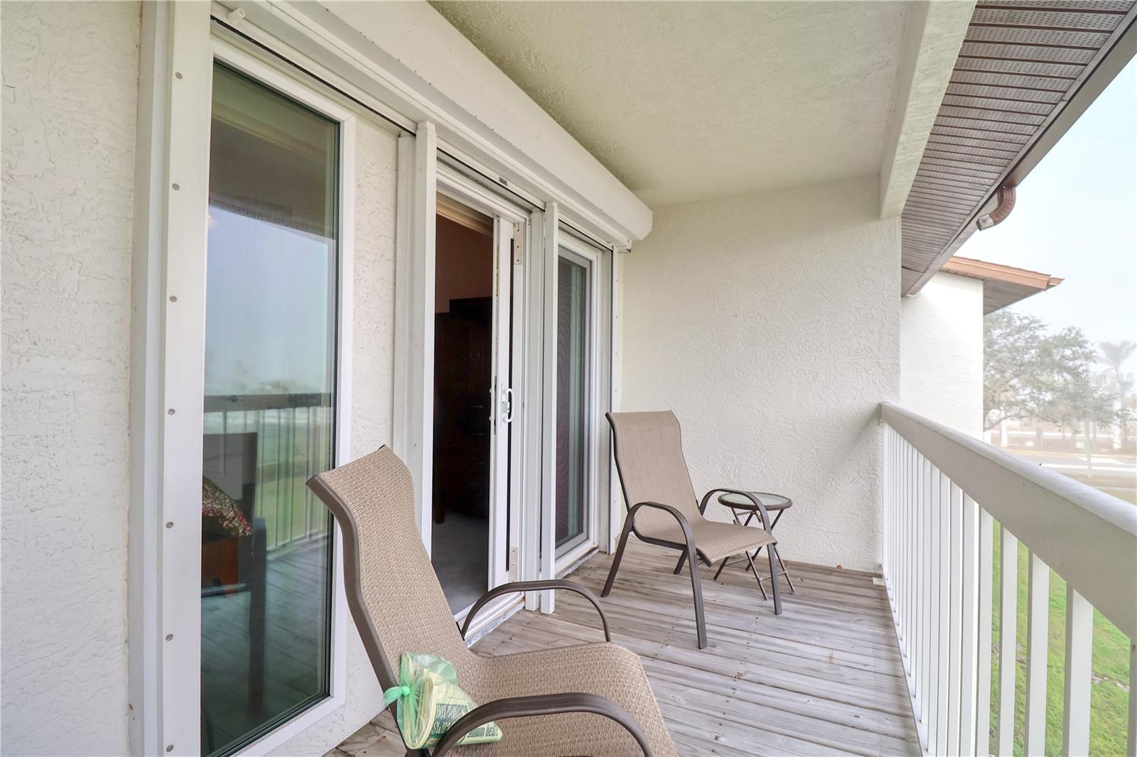 Balcony from primary overlooking the tennis and pickle ball court