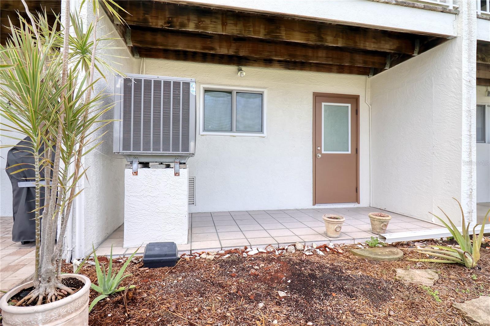 Ground floor exit door from garage to tennis courts