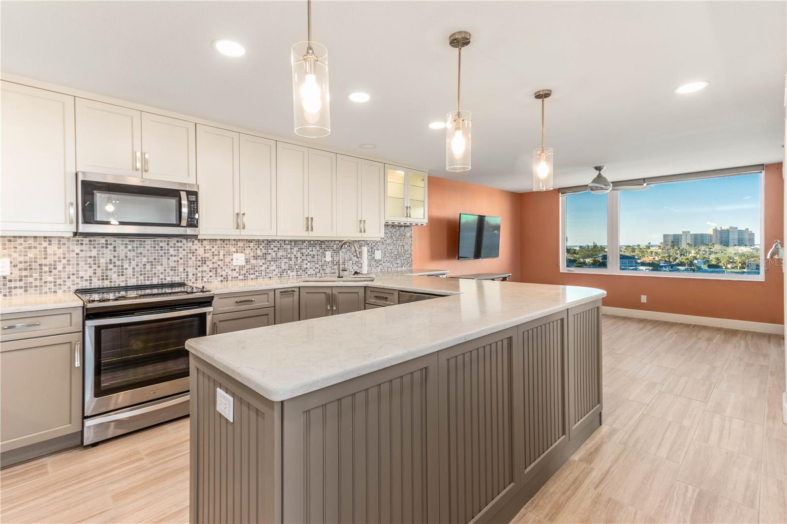 VIEWS OF THE BEACH FROM KITCHEN ADJACENT ANOTHER LIVING AREA