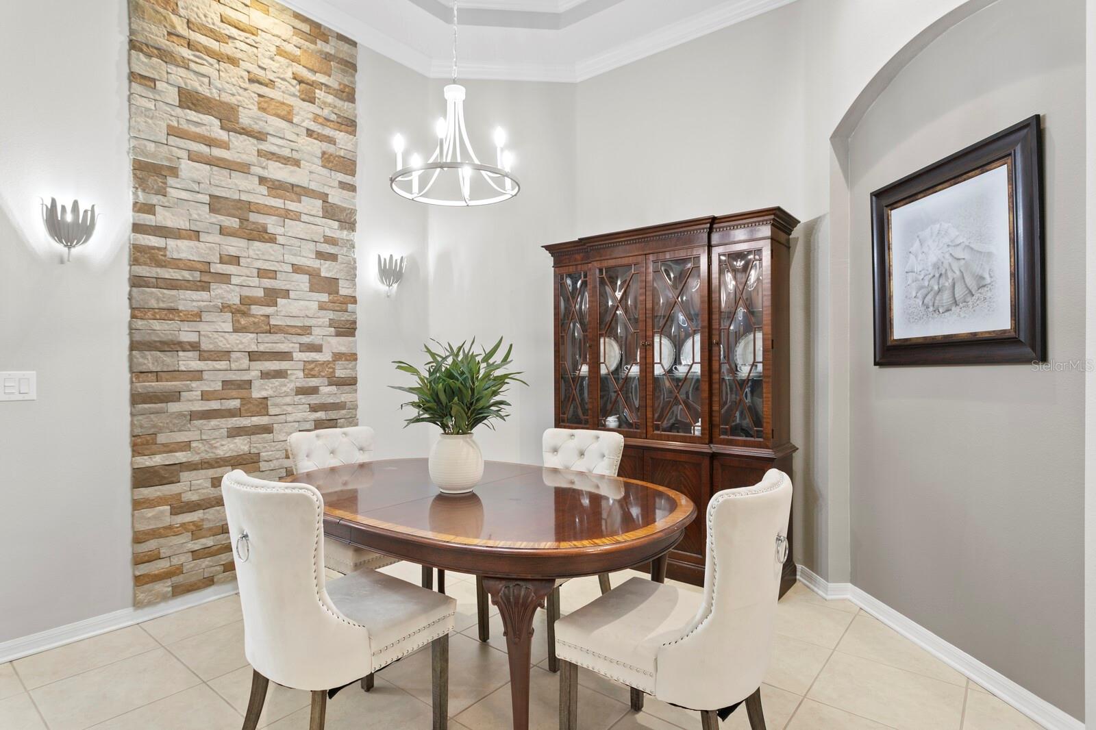 Decorative stacked stone accent wall in the dining room