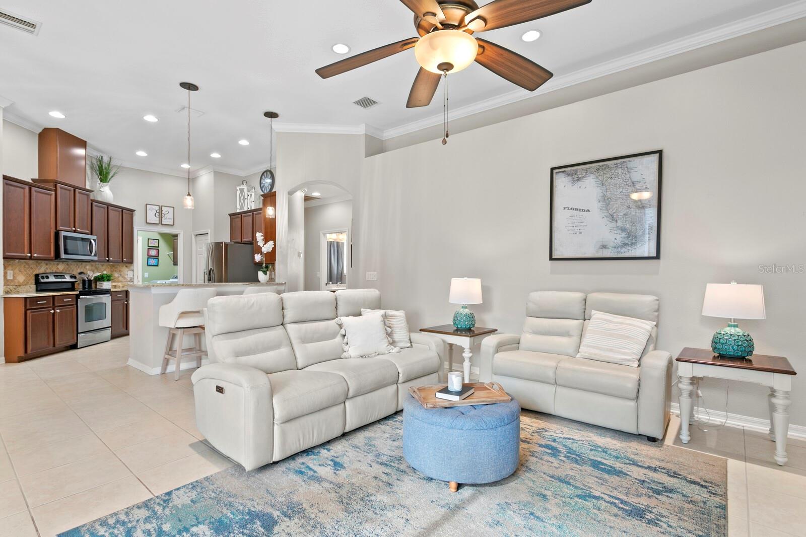 Open concept layout with views from the family room towards the kitchen