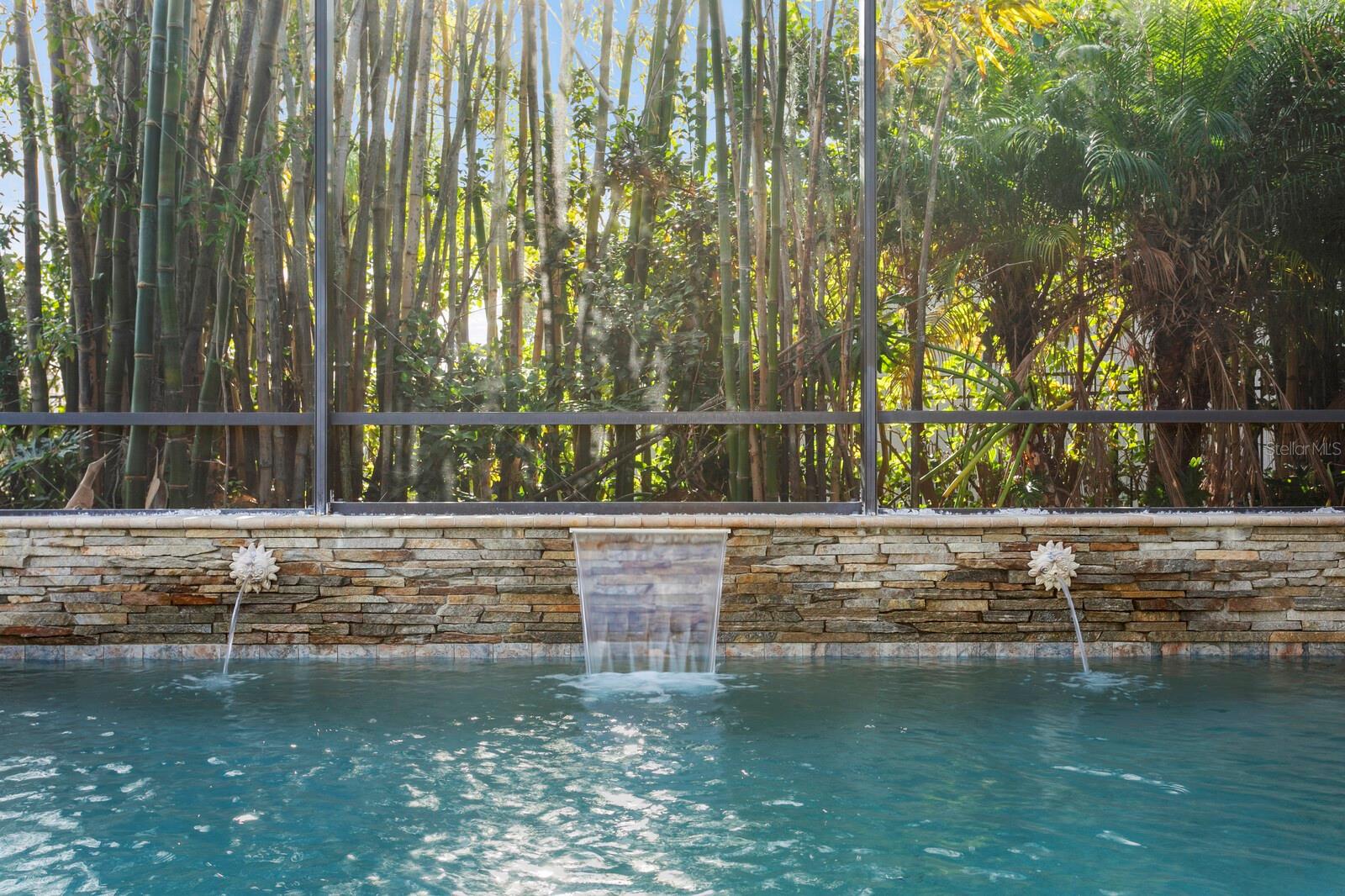 Hand-cut decorative stone wall with water features