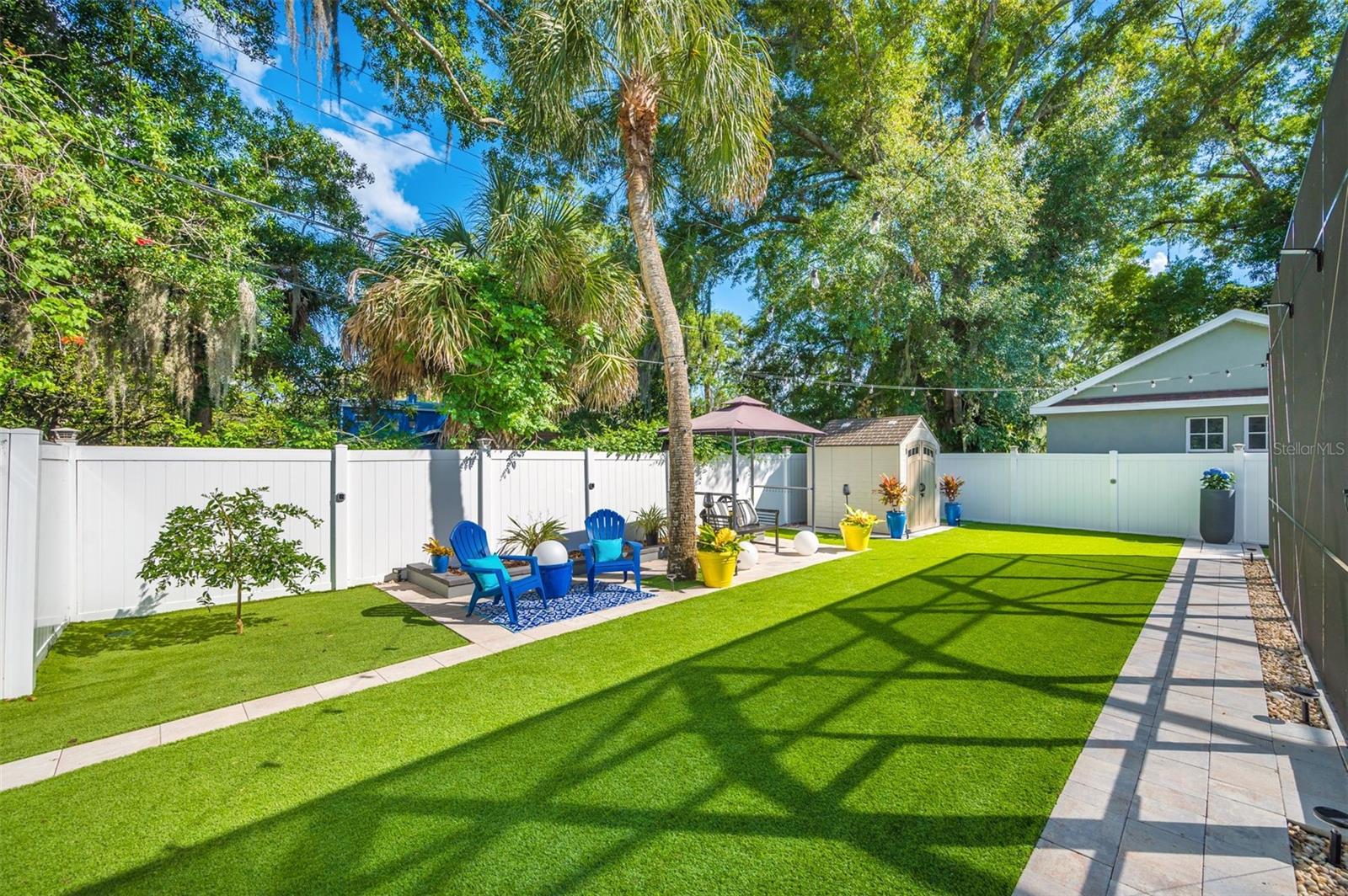 outdoor area has separate shed for pool toys