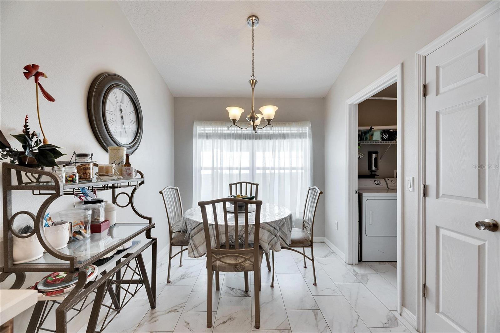 Eat in kitchen space, open to the in door laundry room