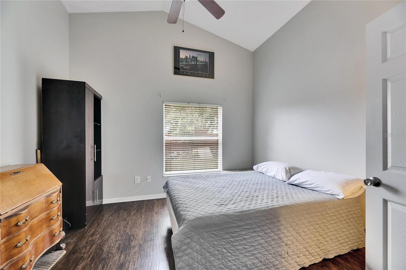 bonus room with high ceilings and double doors for privacy
