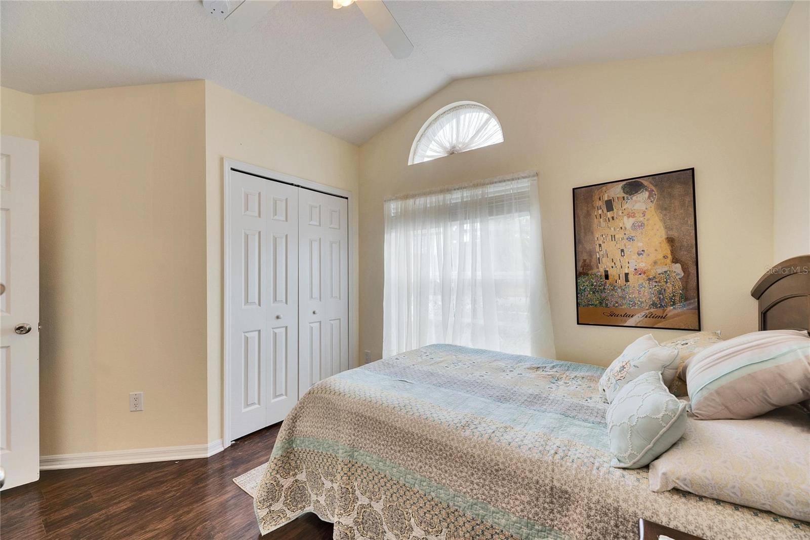 1st of 2 guest rooms with large closets