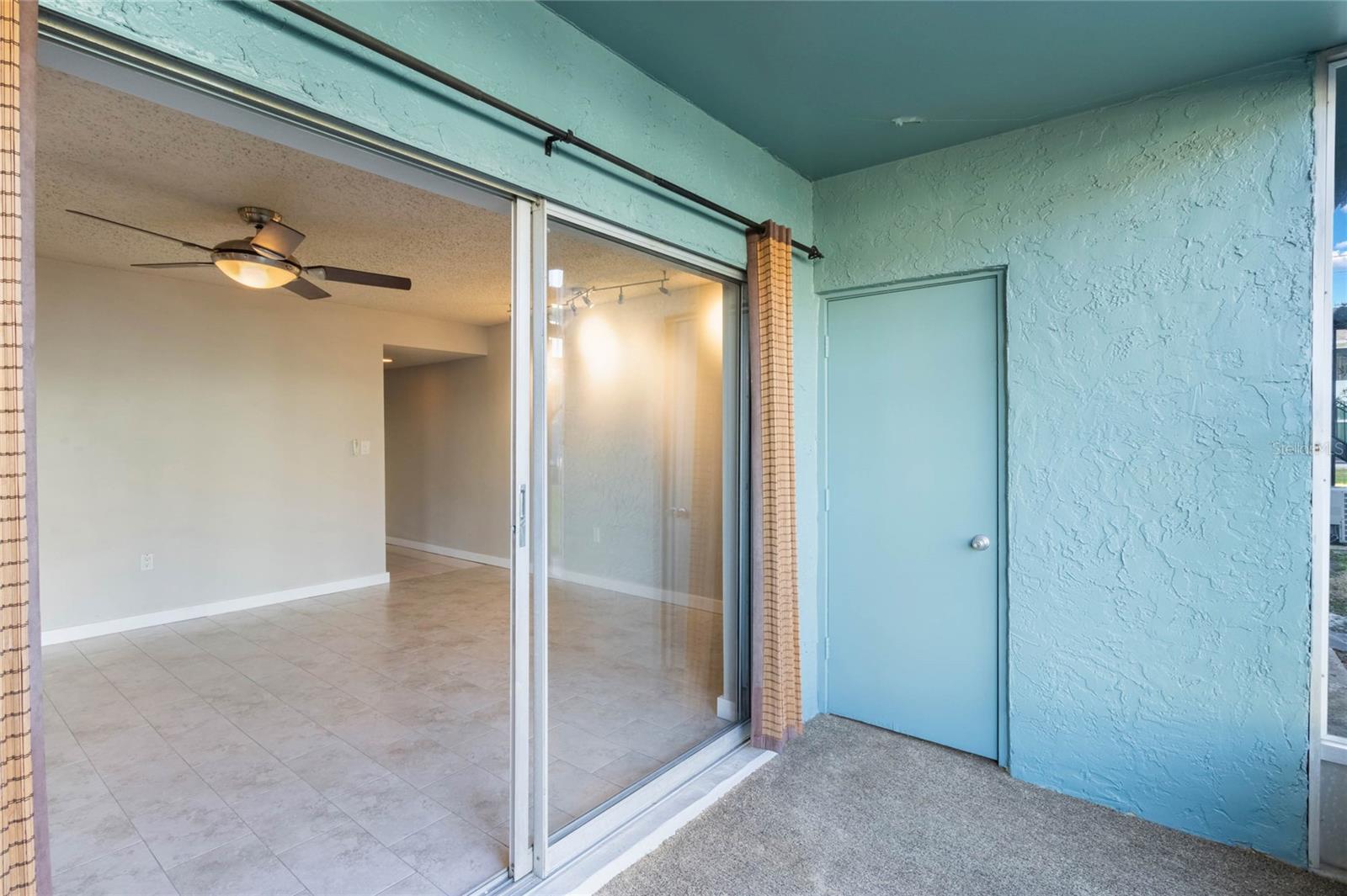 Screen-Enclosed Rear Porch (w/ Storage Closet)