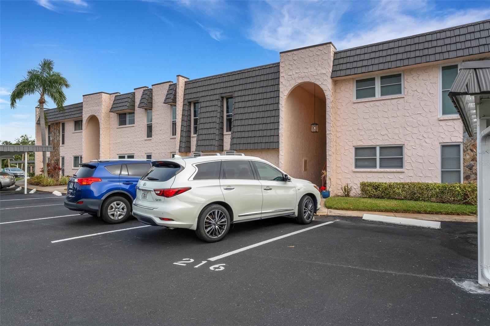 Front of Building With 2 parking Spaces at your entryway