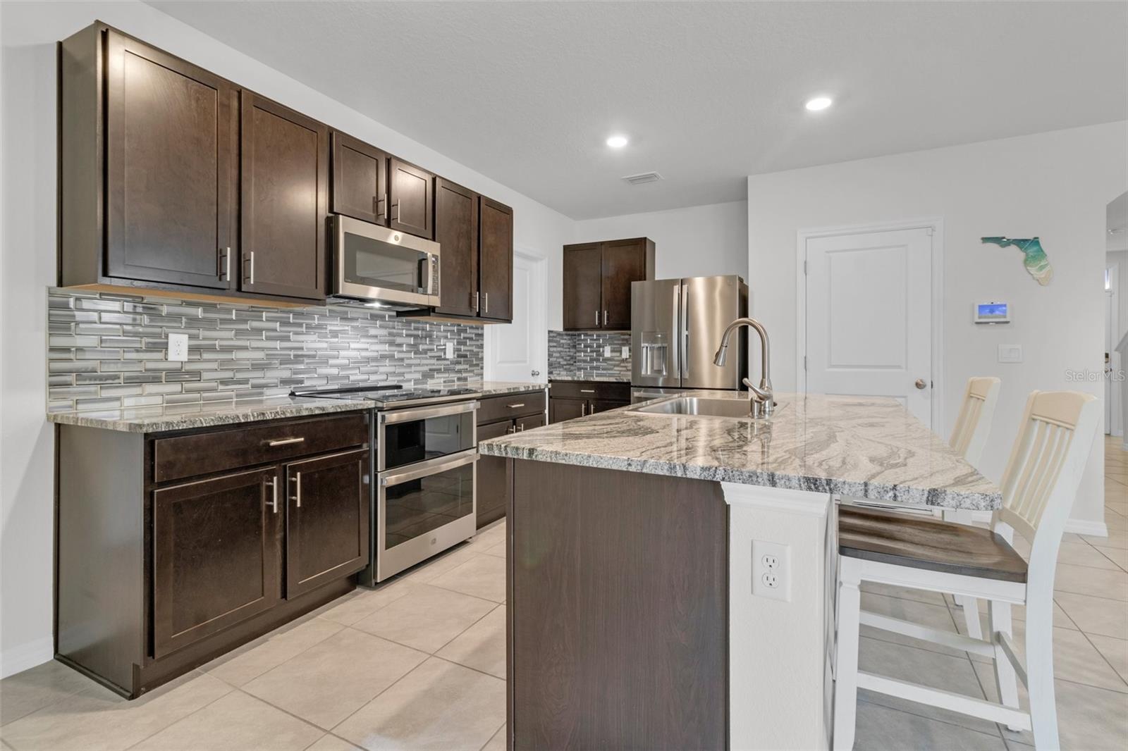 Upgraded kitchen with granite countertops