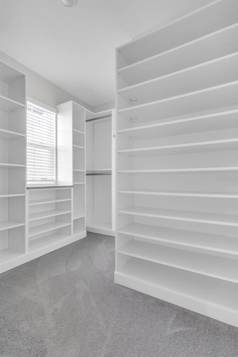 master W/I closet with custom shelving