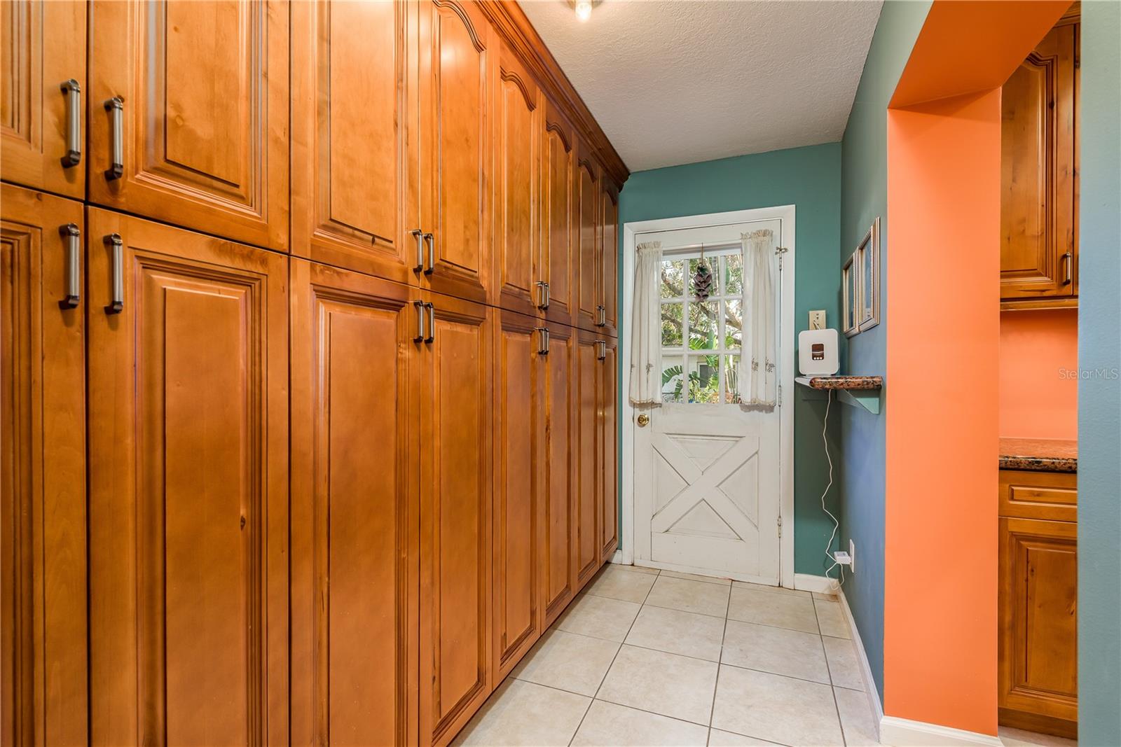 Wall of Storage off kitchen