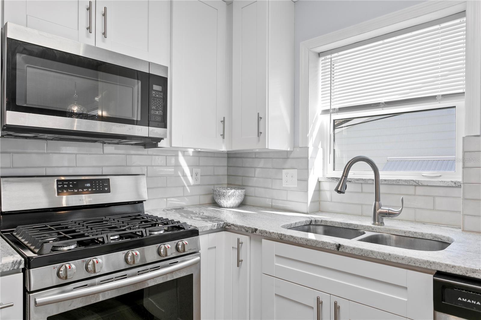 Gas range and tile backsplash for style and functionality