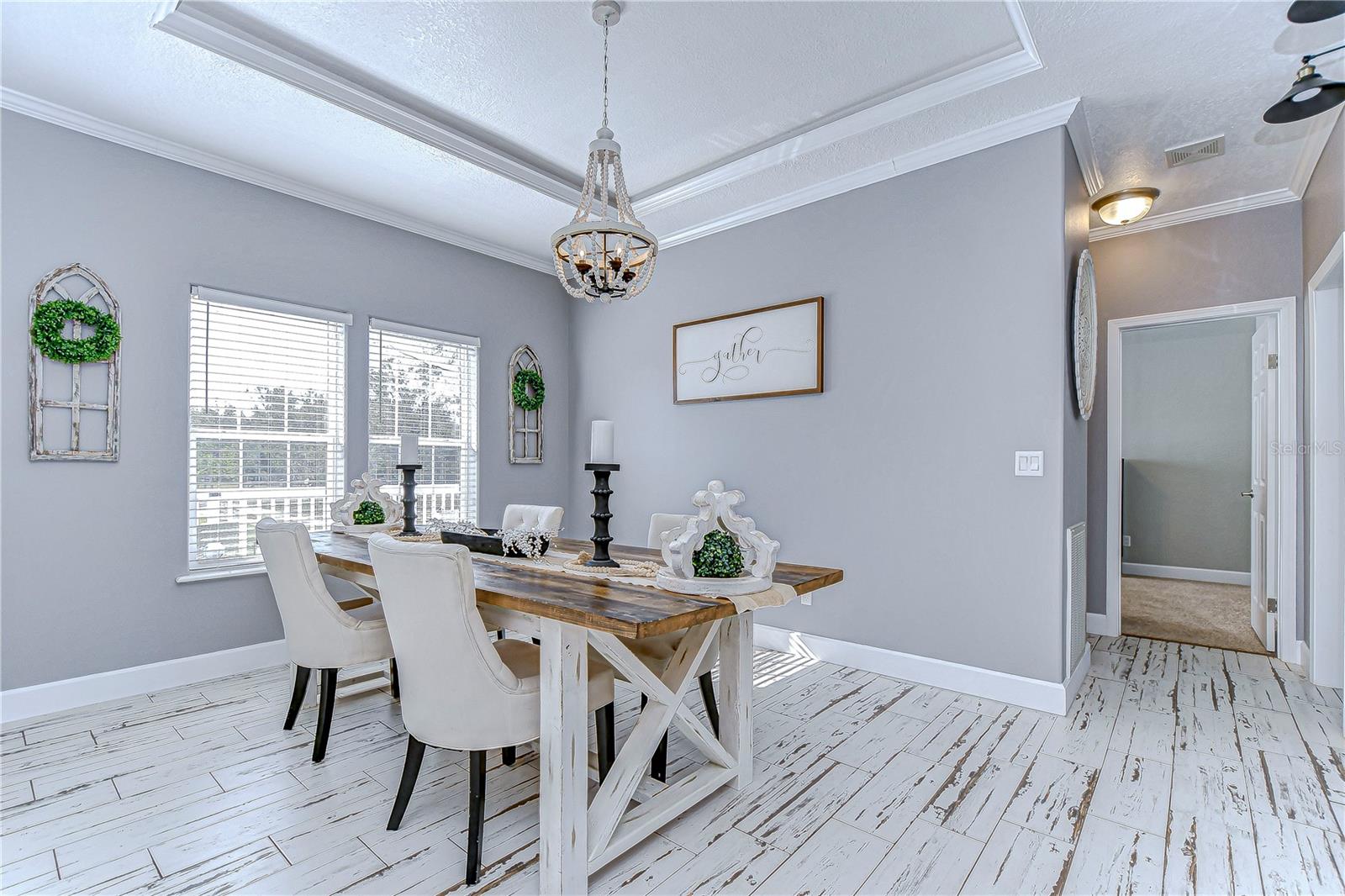 This dining room is right at the front of the home, with plenty of space!