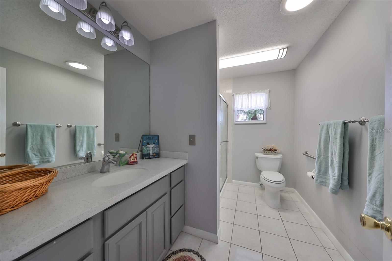 Oversized Guest  Bath with Tile Shower