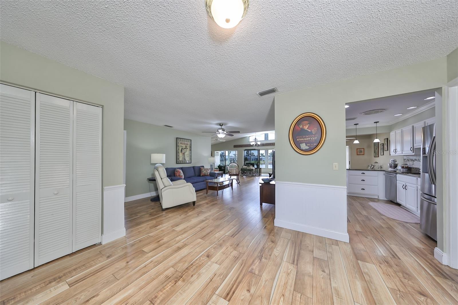 Entry Living Room Remodeled Kitchen, Office/Craft Room  (Left) LVT Flooring